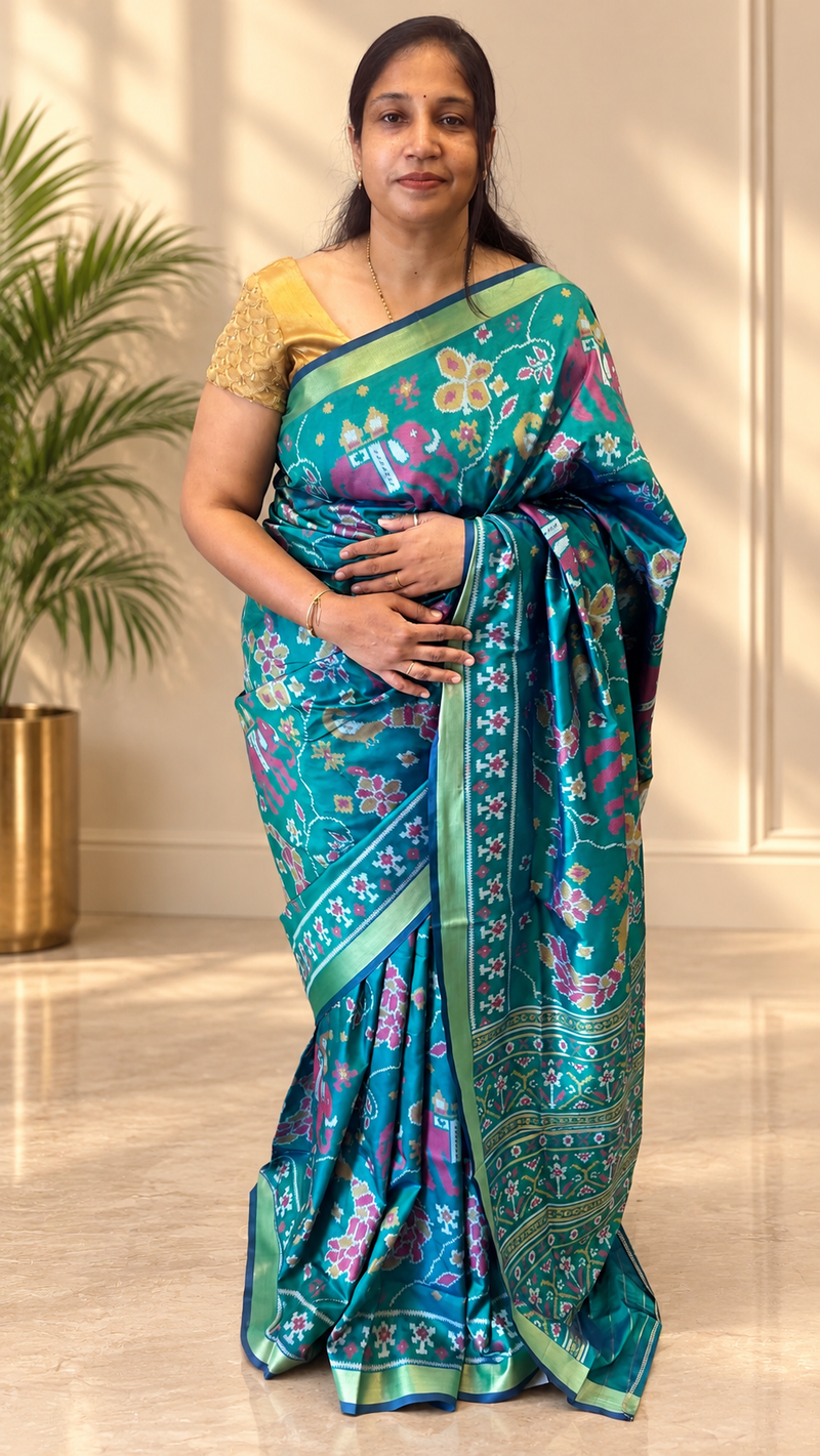 Maya Teal Green Ikkat Print Soft Blended Silk Saree | Radhe Ethnics