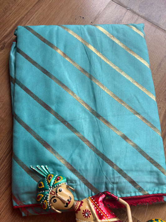 Light Green(Teel) color Lehariya Dola Silk Saree